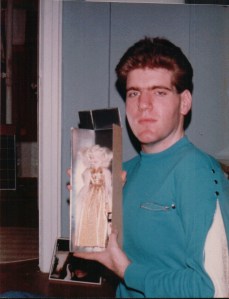 Why John gave me a Marilyn Monroe doll at the Very Yentl Christmas Party I'll never know.  